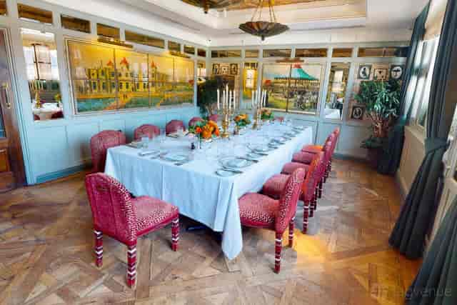 Private dining room at The Old Frizzle Wimbledon, ideal for executive meetings and boardroom dinners.