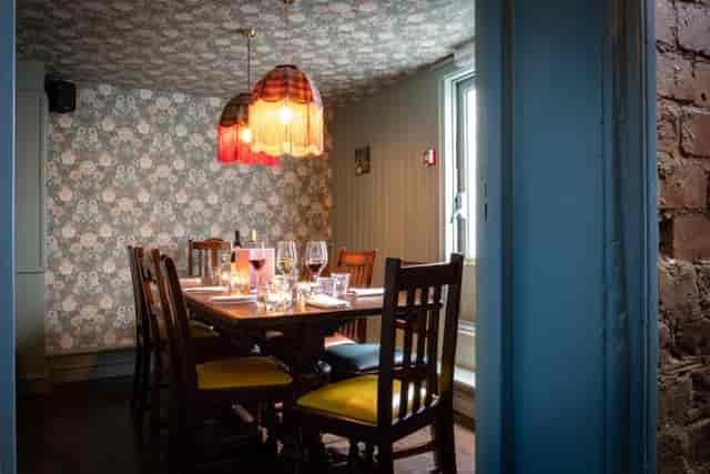 Cozy semi-private dining nook at The Hare, ideal for exclusive board dinners and business lunches.