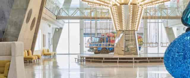 Yellow Building atrium featuring a carousel for unique corporate activations and social events.