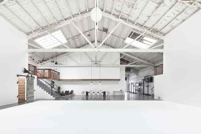 Studio K industrial venue with high ceilings for experiential branding and creative workshops.