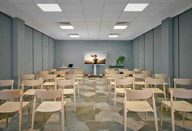 Theater-style breakout room at Citadines Holborn London for workshops and corporate presentations.