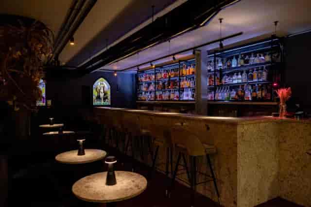 Private Room at Dovetail Bar with atmospheric lighting for VIP networking and corporate receptions.