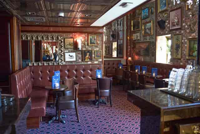 Private Room at Dovetail Bar with banquette seating for VIP breakout sessions and networking.