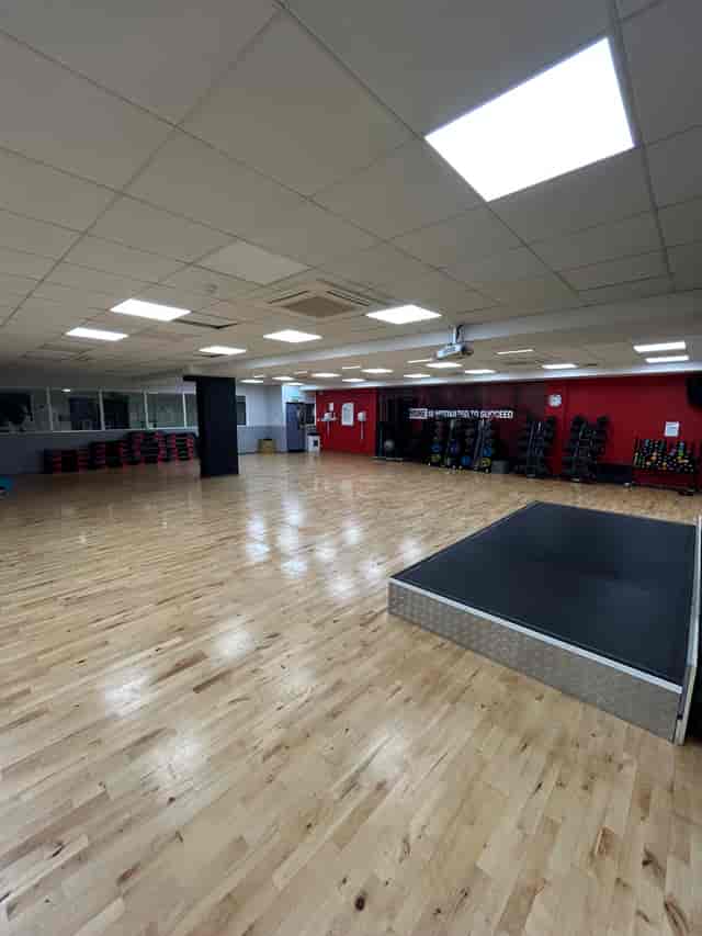 Spacious studio with wood floors, ideal for wellness workshops and team building events.