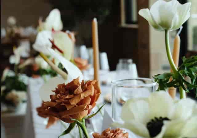 Sophisticated floral tablescape at Colin's Bar, perfect for high-end gala or wedding reception.