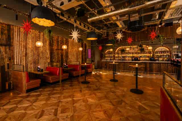 Market Halls Paddington venue for cocktail reception and networking event with central bar.