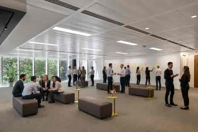 Collaborative workshop space with modular seating for London conference events.