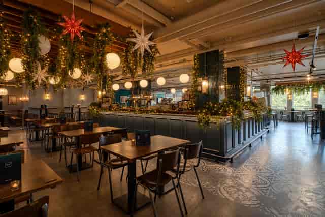 Industrial-chic Christmas venue for corporate mixers and evening receptions.
