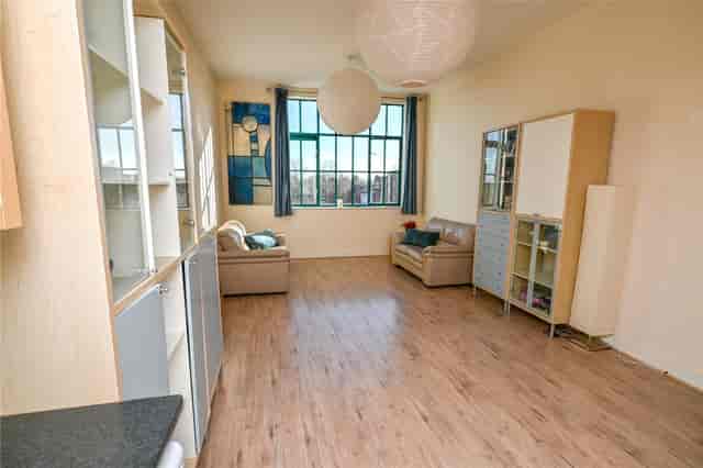 Bright Moseley Community Hub breakout space for networking and client meetings.