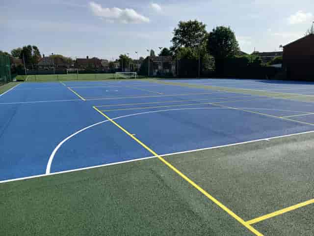 Large outdoor MUGA pitch at Kings Heath Secondary School for sports tournaments and team building.
