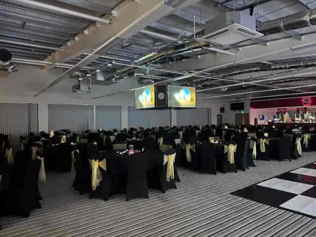 Moseley Sports Centre gala hall with banquet seating for corporate awards and events.