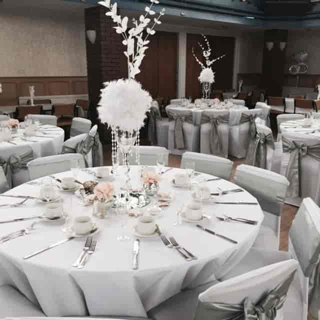 Banquet setup at The Gallery, Moseley with feather centerpieces for wedding or gala events.