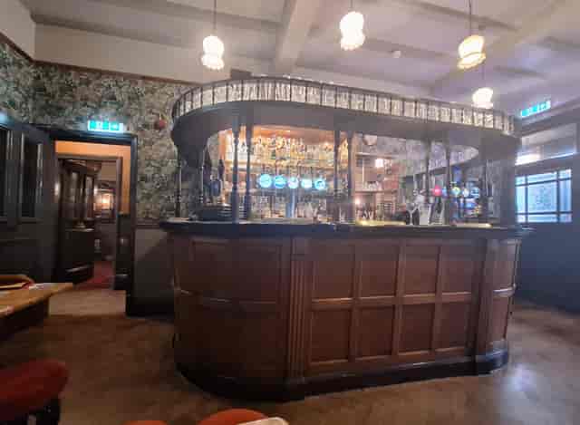 Classic pub lounge at Moseley Golf Club for networking events and conferences.