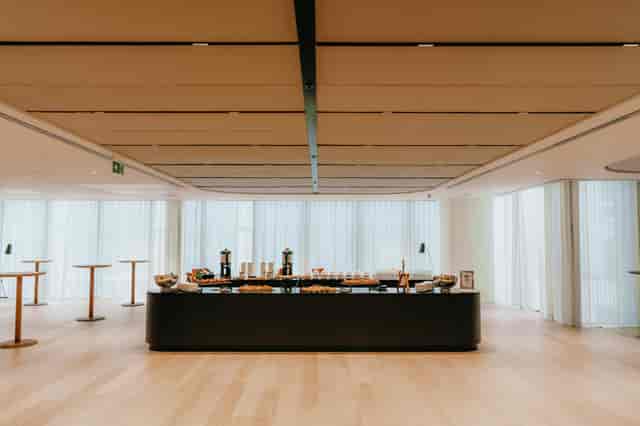 Modern pre-function space at The Assembly for corporate networking and coffee break events.