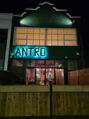 Antro Bar industrial event venue for evening receptions and post-conference mixers.