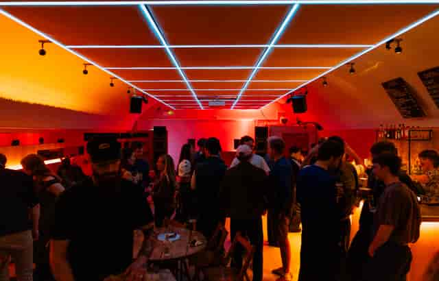 Lounge-style event space at Bird House Brewery with immersive lighting for receptions and mixers.