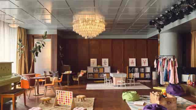 Modern luxury kids' club space with flexible seating, ideal for corporate retreats or family events.