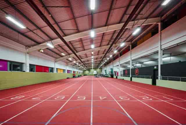 Willesden Sports Centre indoor track: spacious venue for trade shows and team-building events.