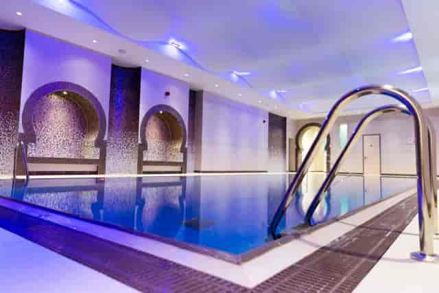 Luxury indoor pool at The Maqam Centre for executive wellness retreats and corporate events.