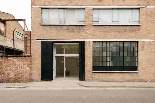 Industrial-chic raw venue at Mill Row Club for pop-up galleries and creative workshops.