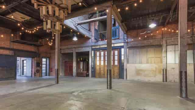 Industrial-chic Mill Row Club venue, blank canvas space for experiential events and gala layouts.