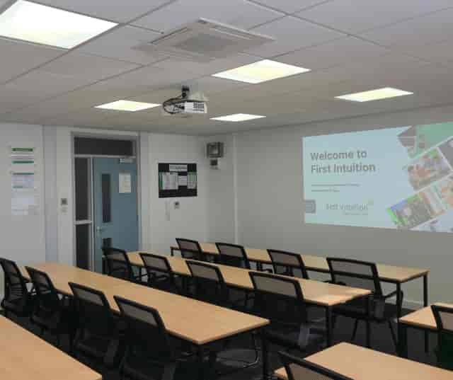 Classroom-style training room at The Hawth with tiered tables for corporate workshops and seminars.