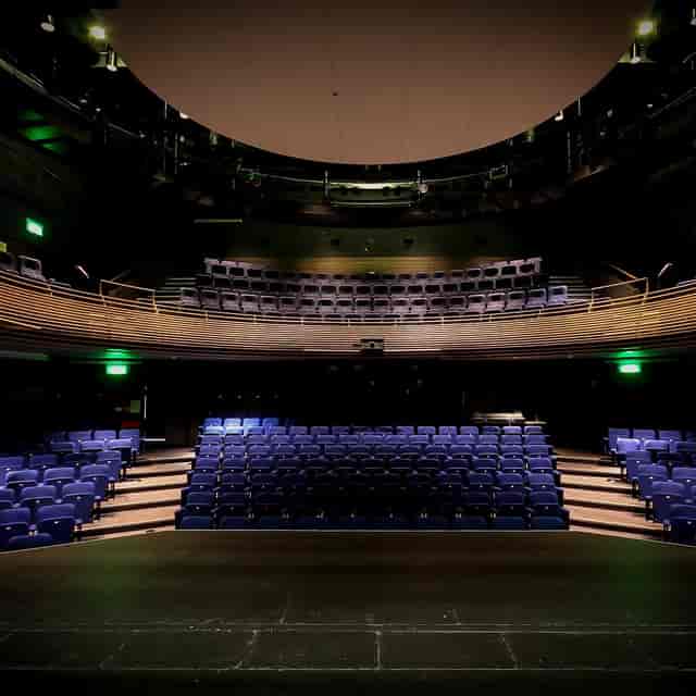 Tiered proscenium Studio 1 at Chequer Mead Theatre, ideal for keynotes and plenary sessions.
