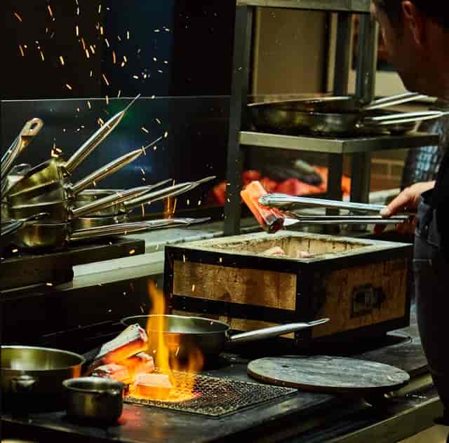 Live cooking station at Holy Carrot venue for corporate reception and evening gala events.