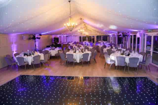Luxury marquee wedding reception at The Bridoon Hogarths Solihull with starlit dance floor.