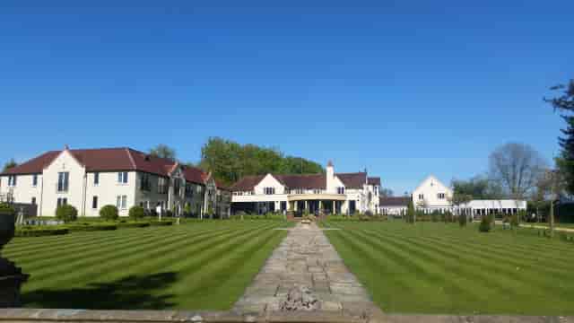 The Coach House Solihull venue with manicured lawns for corporate retreats and weddings.