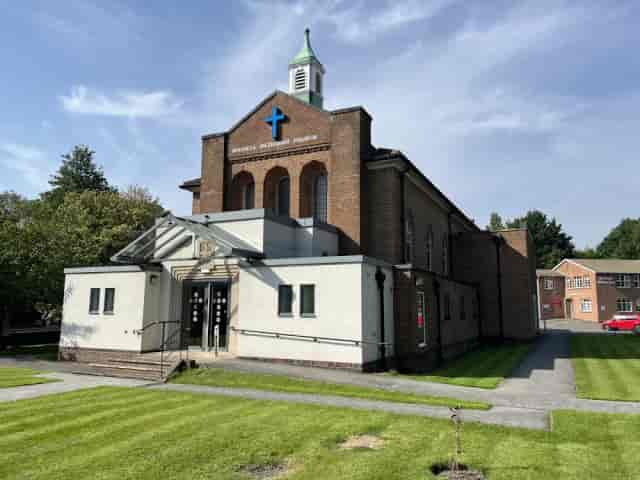Solihull Methodist Church brick building with modern entrance, ideal for community events venue.