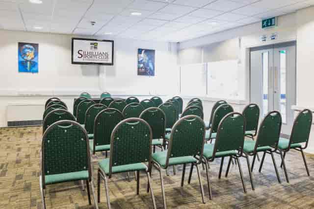Windsor Room theater-style setup for corporate presentations and community workshops.