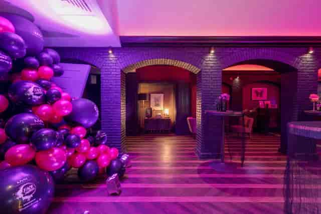 Pasteur Room lounge with balloon installation for evening events and brand activations.