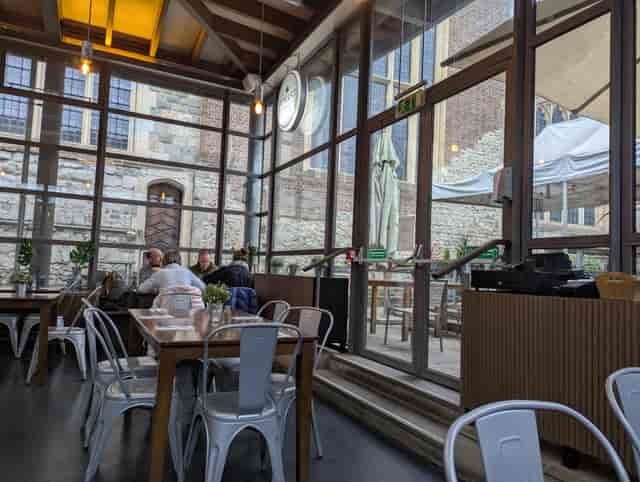 Industrial indoor dining room for small-group breakout events and corporate meetings.