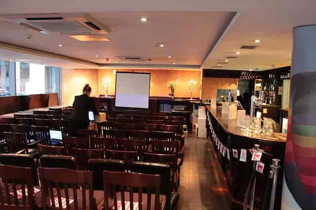 The Boardroom at Davy's: Theater-style meeting space for corporate presentations and events.