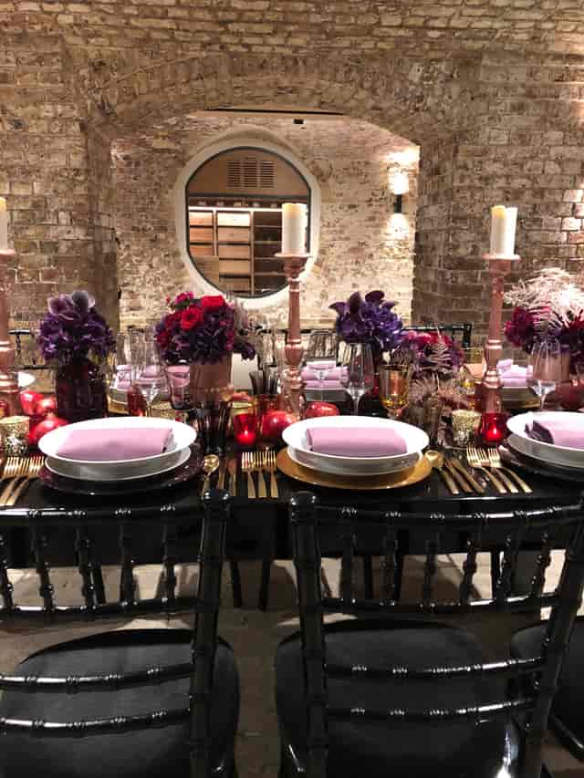 Moody tablescape in a private dining room for luxury gala and corporate dinner events.