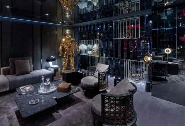 Modern VIP lounge with mirrored decor for exclusive networking and corporate offsite events.