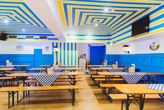 Half Bierhalle communal seating at Munich Cricket Club for corporate team-building and mixers.