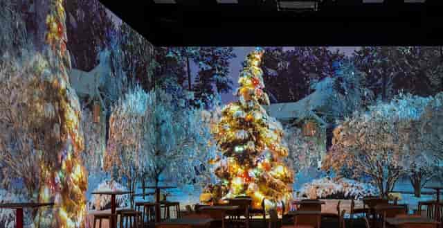 Canvas Studios catering area with immersive projection mapping for holiday event venue rentals.