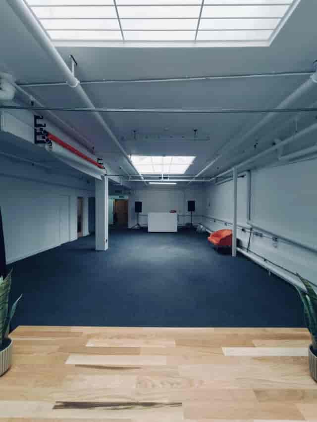 Industrial event space at Canvas Studios with exposed utilities, perfect for venue hire and events.