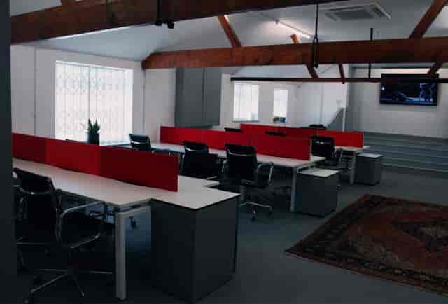 Industrial coworking space at Ravenor Farm Studios for off-site meetings and team collaboration.