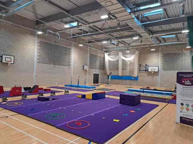 Audenshaw School sports hall: versatile venue for gymnastics and community events.