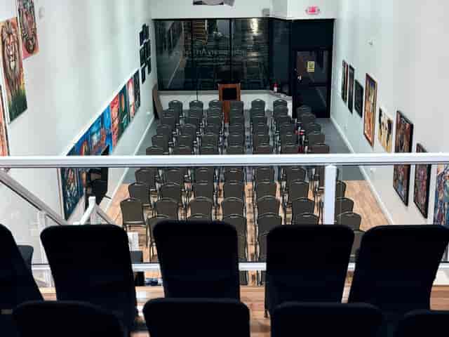 Main Club Room lecture setup in Fusion gallery for corporate events and presentations.