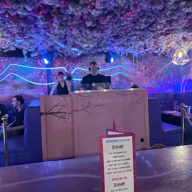Pink Party Room at Jaloux with floral ceiling; ideal for brand activations and evening events.