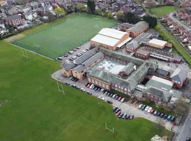 3G pitch at Audenshaw School with parking, ideal for athletic camps and team-building retreats.