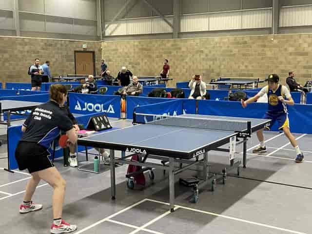 Maidstone Leisure Centre sports hall with branded court barriers for indoor tournament setup.