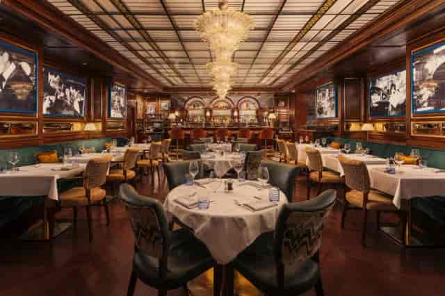 Classic ground floor banquet room for upscale corporate dinners and networking events.