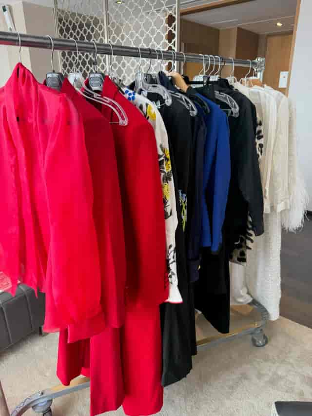 Professional wardrobe rack for executive conference and corporate event attire.