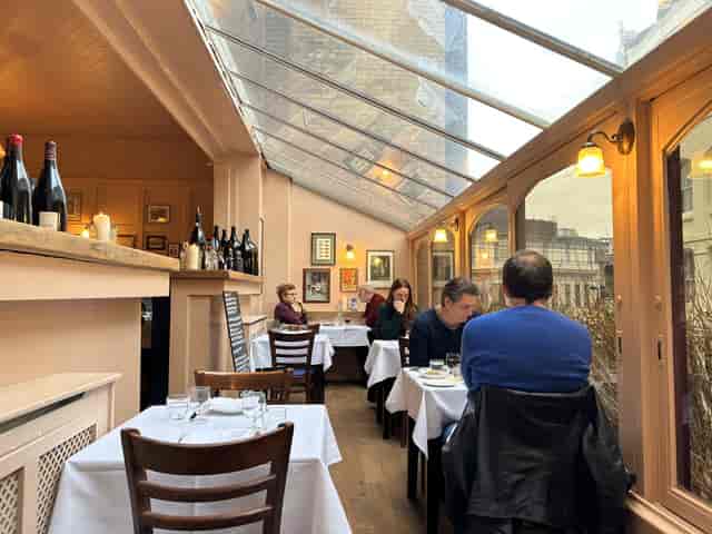 Morchella sun-drenched wine bar conservatory for intimate corporate lunch or board breakout.