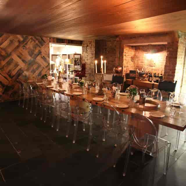 ROMA Room rustic-chic private dining, reclaimed wood decor for executive dinners and networking.